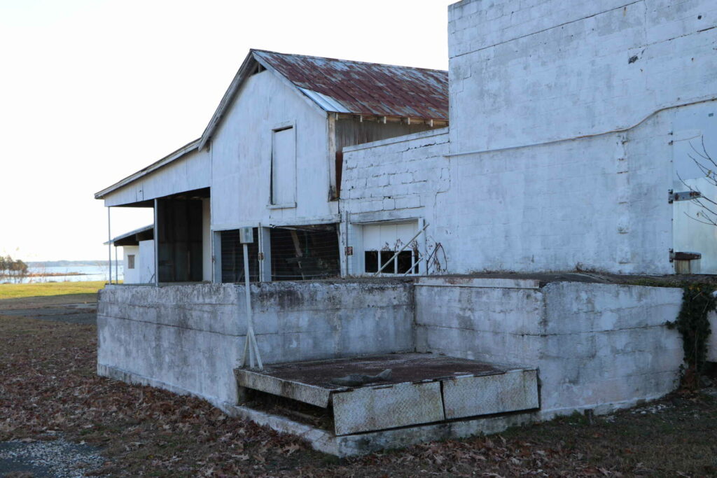 a white building with a concrete floor.