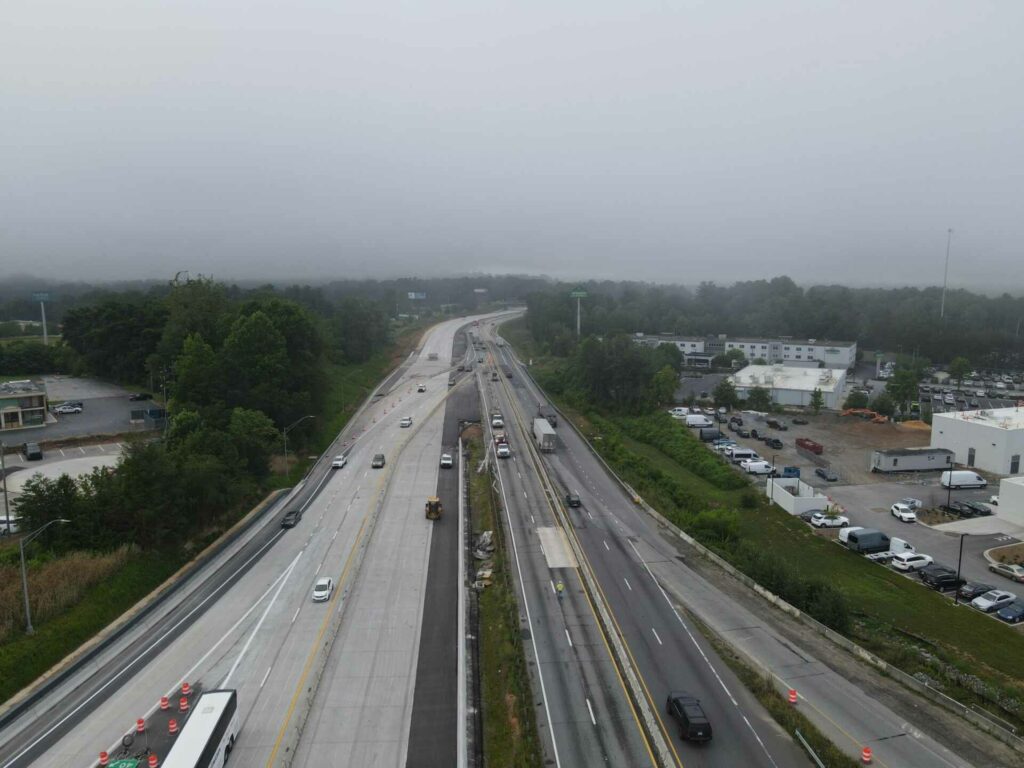 a highway with cars on it