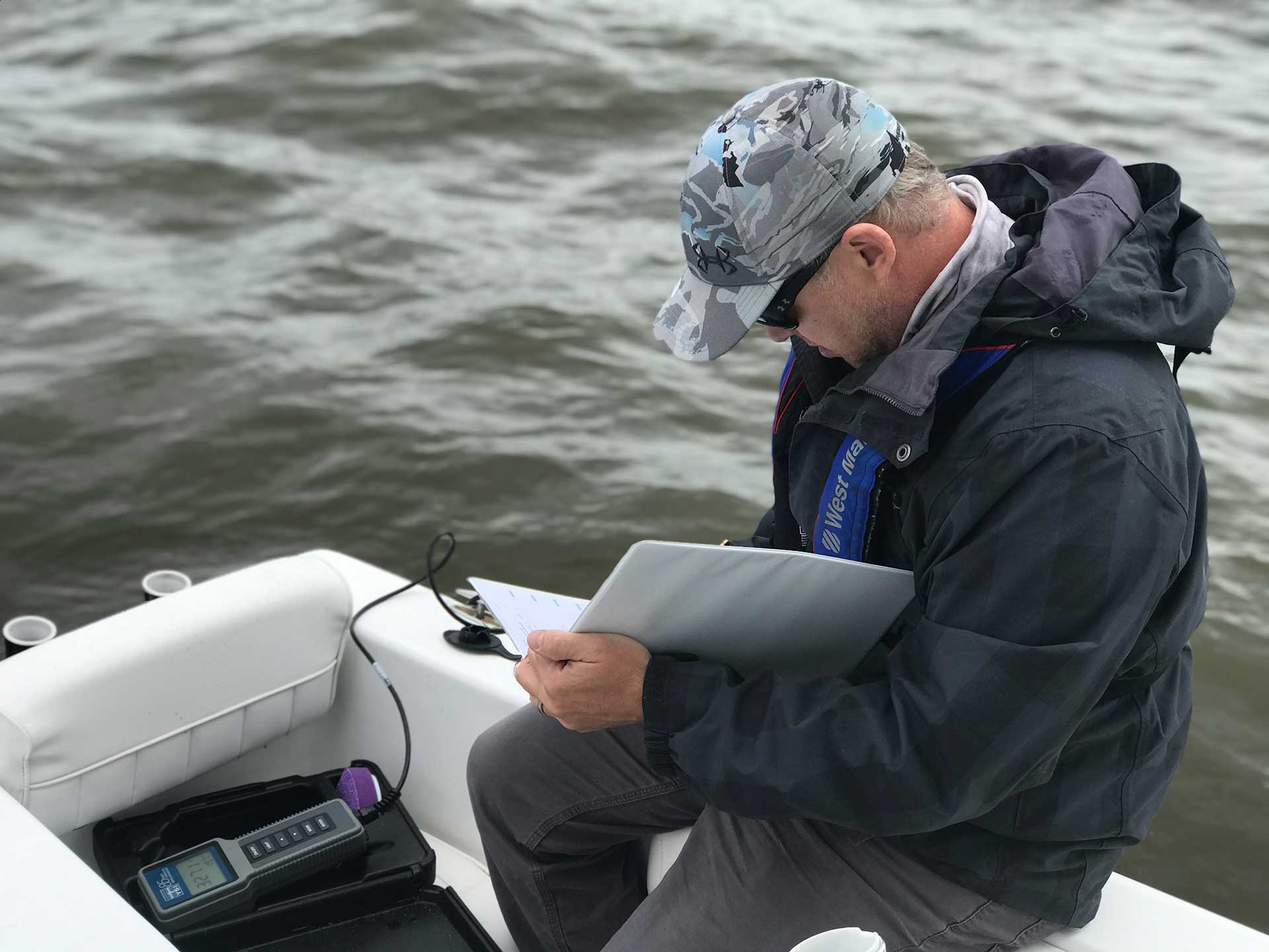 Taking water quality samples for a biological study in North Carolina's Outer Banks.