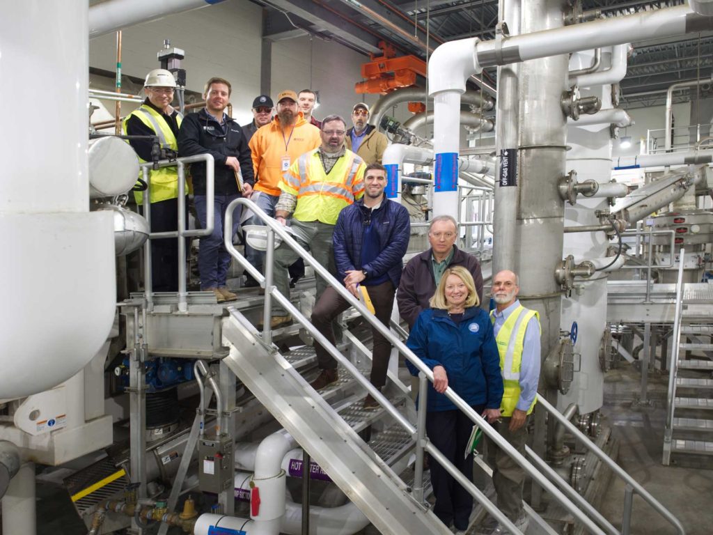 The project team inside the HRRSA biosolids management dryer facility.