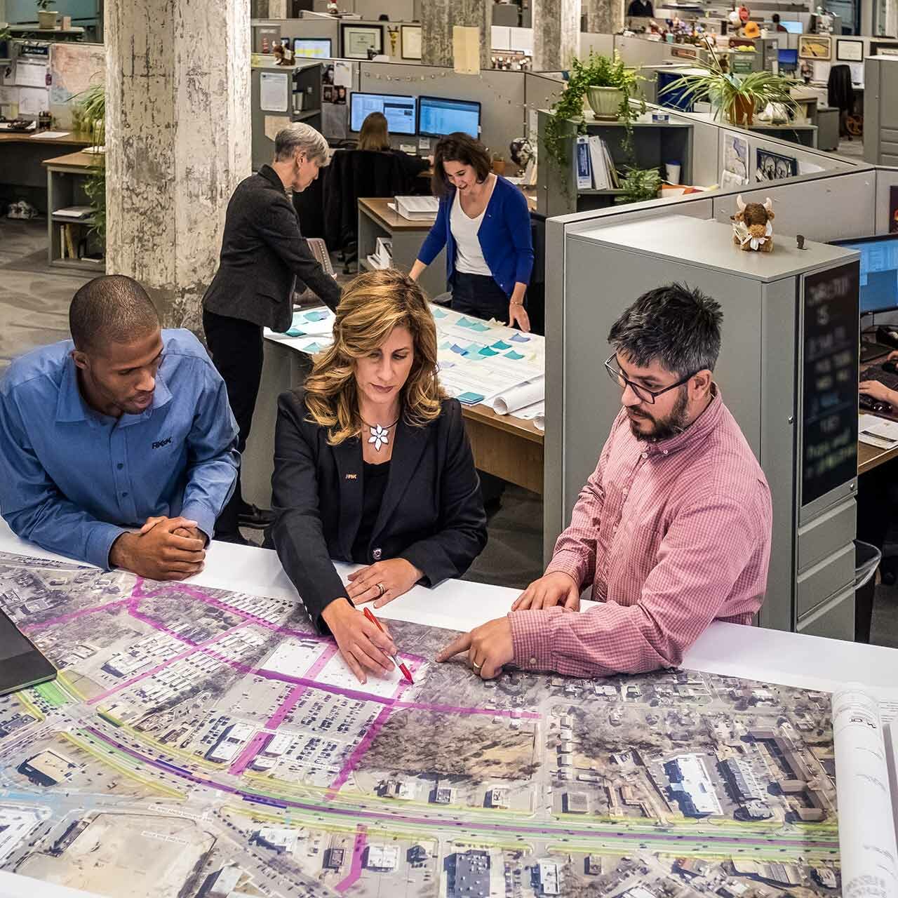 RK&K Team Members Reviewing Design Plans in the Office in Baltimore, MD