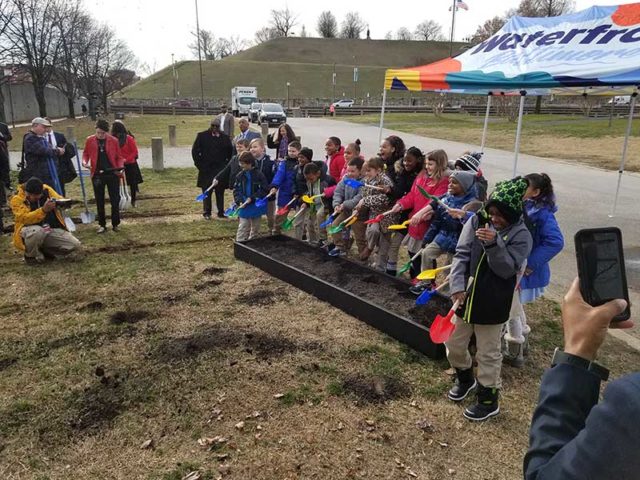 Students from the Francis Scott Key School breaking ground.